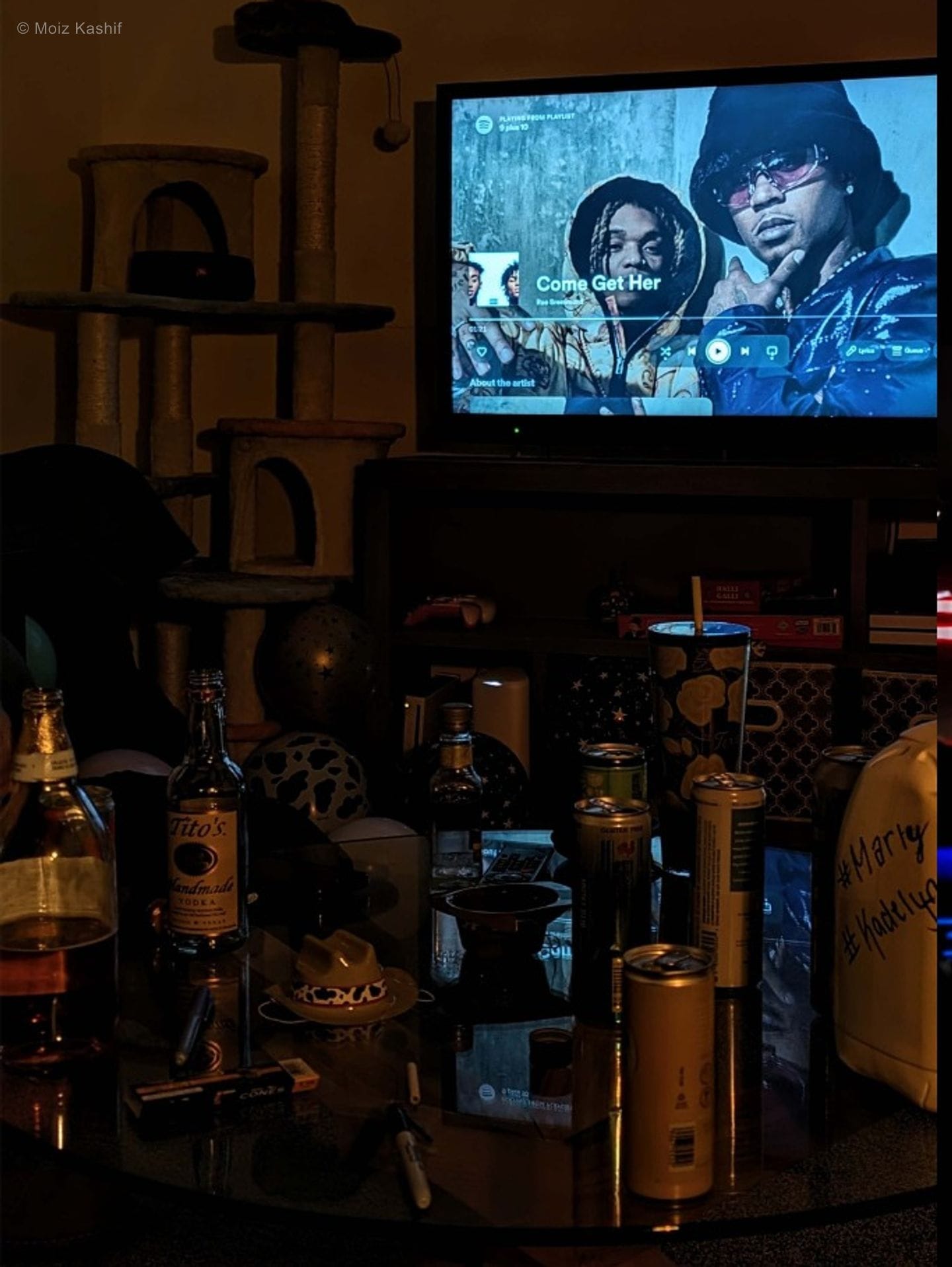 A television and objects in a domestic room in the fourth Mental Health frame.